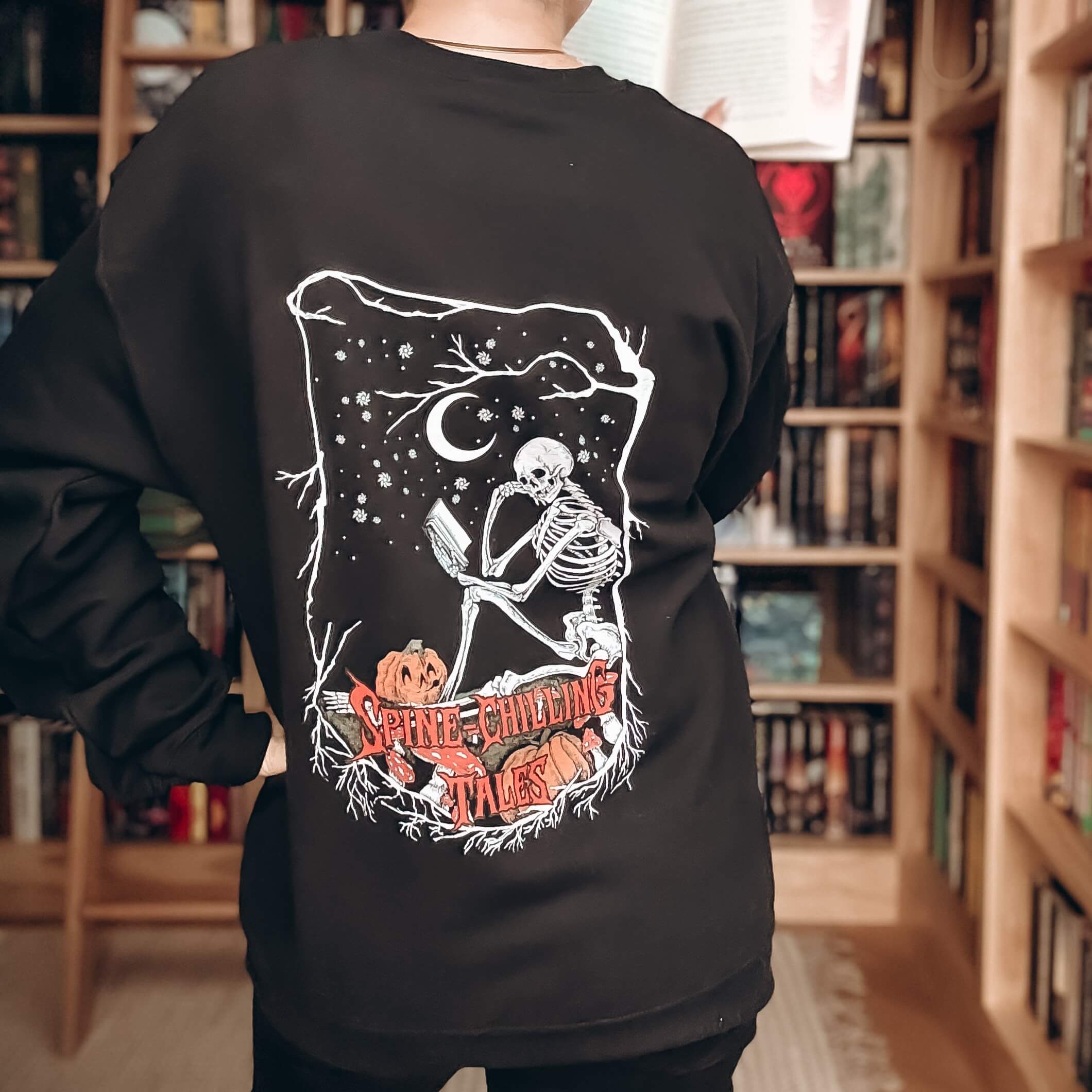 Spine-Chilling Tales Skeleton Sweatshirt - Image 2